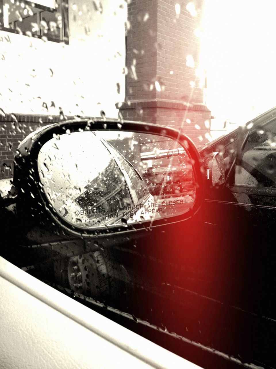 transportation, mode of transport, land vehicle, car, close-up, side-view mirror, glass - material, vehicle interior, window, transparent, car interior, part of, travel, reflection, headlight, wet, water, indoors, focus on foreground, drop