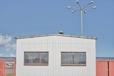 Low angle view of building against blue sky