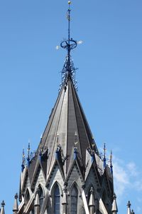 Low angle view of traditional building against clear blue sky