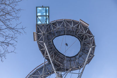 Low angle view of basketball hoop against clear sky