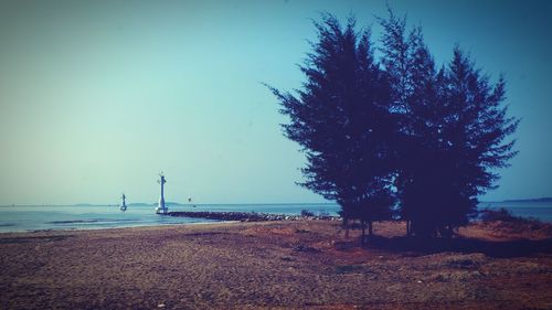 Scenic view of sea against clear blue sky