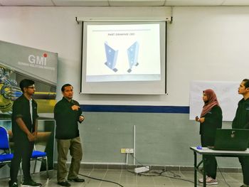 People standing in front of building