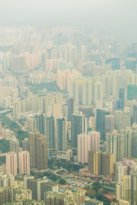 High angle view of buildings in city against sky