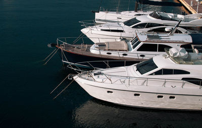 Boats moored at harbor