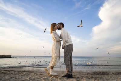 Kaliningrad, russia. young couple in love on the seaside