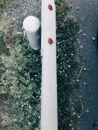 High angle view of metal pole on field