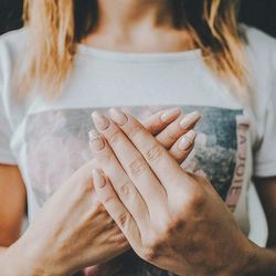Close-up of woman hand with tattoo