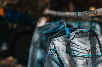 Close-up of clothes hanging outdoors