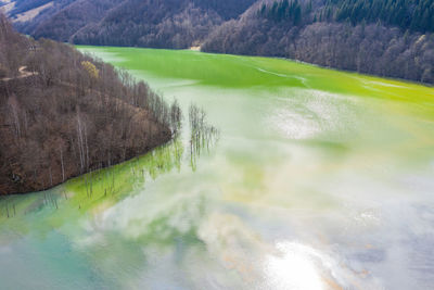 Aerial view of toxic residuals flooding a lake from a copper mine exploitation. geamana,  romania