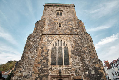 Low angle view of historic building against sky