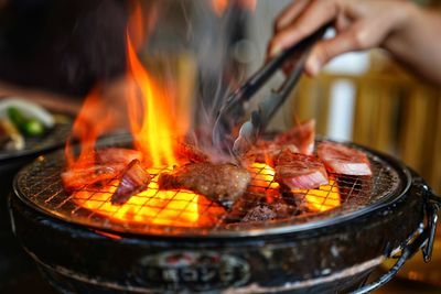 Close-up of meat cooking on barbecue grill