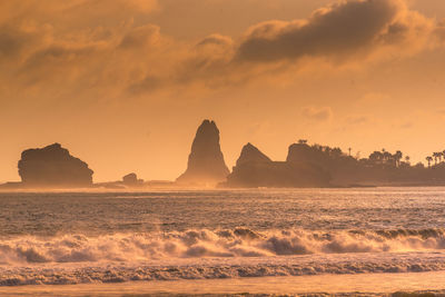 Scenic view of sea against sky during sunset