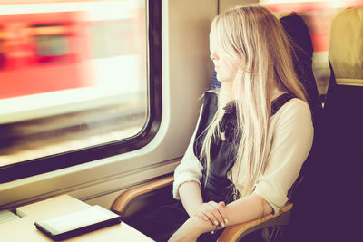 Woman traveling in train