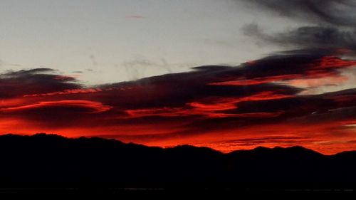 Scenic view of dramatic sky during sunset