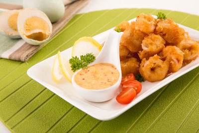 Close-up of served food in plate