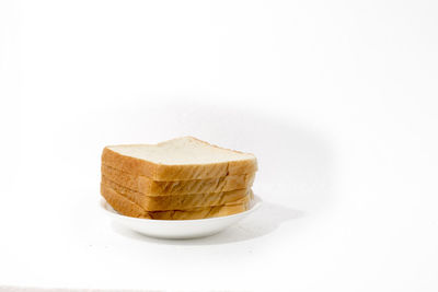 Close-up of cake against white background