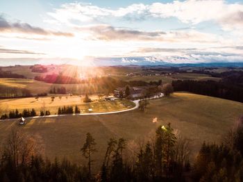 Scenic view of landscape against sky during sunset