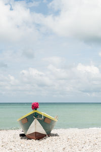 Colourfull boat on a beach in france on a sunny day