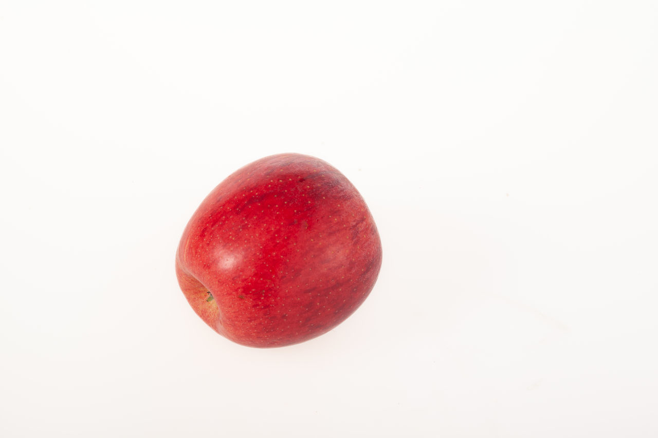 food, food and drink, fruit, red, healthy eating, produce, wellbeing, freshness, white background, studio shot, plant, single object, cut out, pink, copy space, no people, indoors, close-up, apple - fruit