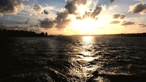 Scenic view of sea against sky during sunset