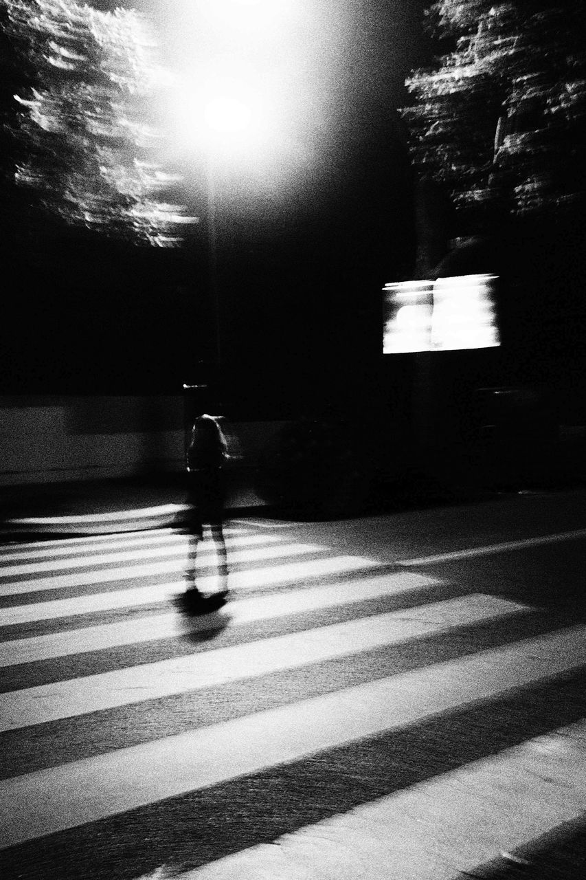 lifestyles, walking, leisure activity, full length, street, men, shadow, silhouette, road, rear view, person, sunlight, unrecognizable person, on the move, outdoors, road marking, standing