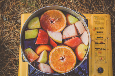 High angle view of fruits in container on table