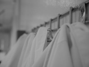 Close-up of clothes hanging on clothesline