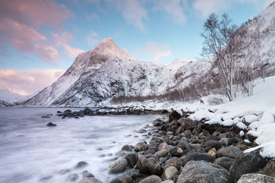 Scenic view of snowcapped mountains against sky