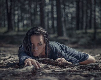 Portrait of mid adult woman in forest