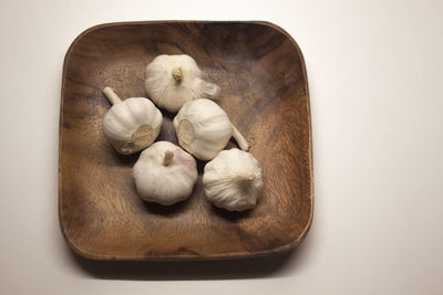 High angle view of eggs on table against white background