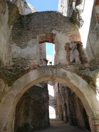 Low angle view of old building against sky