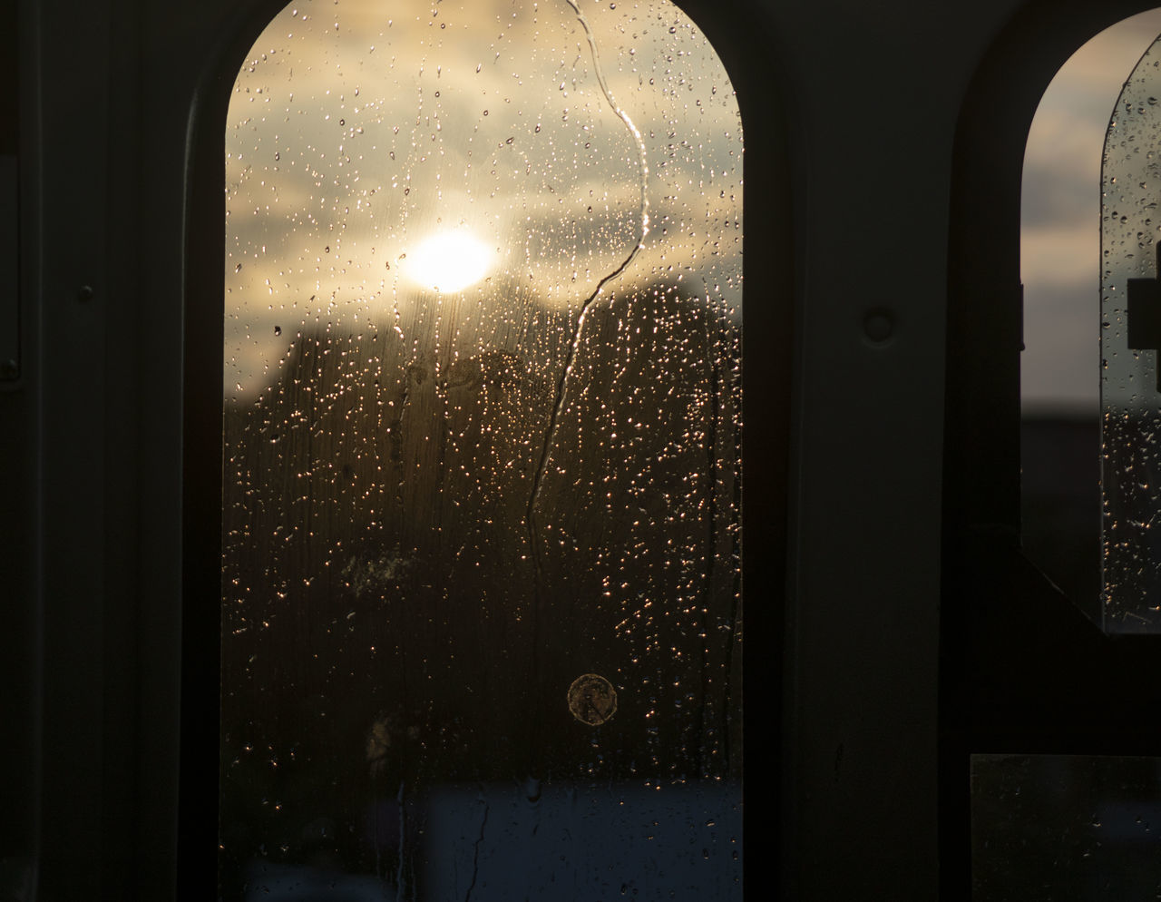 RAINDROPS ON WINDOW GLASS