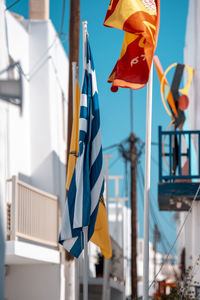 Low angle view of flag against sky