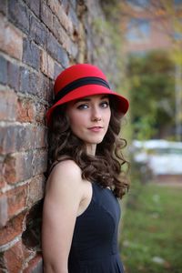 Portrait of a teenage girl wearing hat