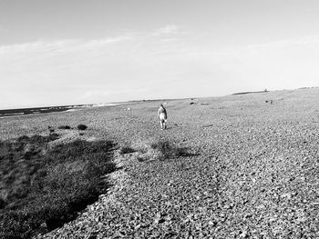 People walking on beach