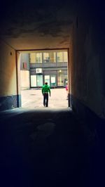 Man walking in corridor