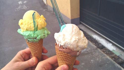 Close-up of hand holding ice cream