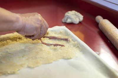 Midsection of person preparing food