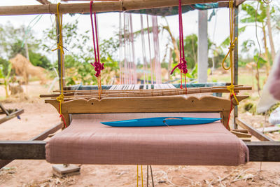 Close-up of empty swing in playground