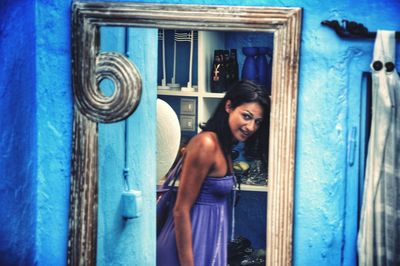 Full length portrait of young woman