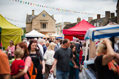 Crowd walking at street market