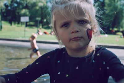 Close-up portrait of girl at park