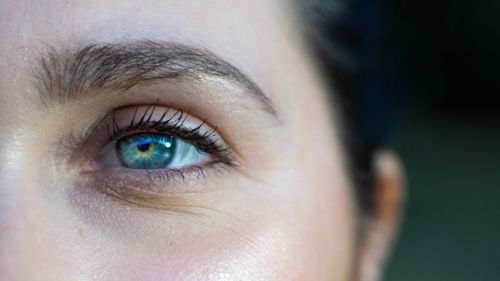 Close-up of woman eye looking away