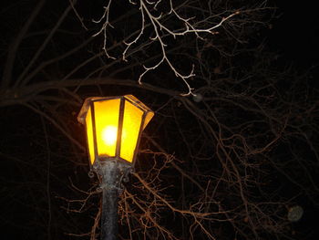 Low angle view of illuminated street light