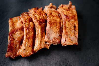 High angle view of meat on barbecue grill