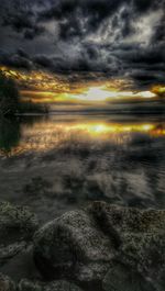 Scenic view of sea against cloudy sky