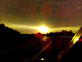 Road against sky during sunset