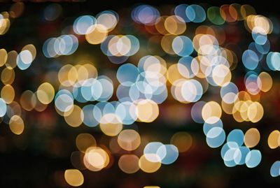 Defocused image of illuminated lights at night