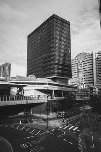 Buildings in city against sky