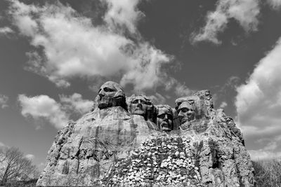 Low angle view of statue against sky